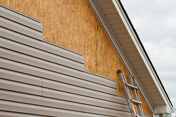 Professional Siding Replacement technician working in Enfield, NC